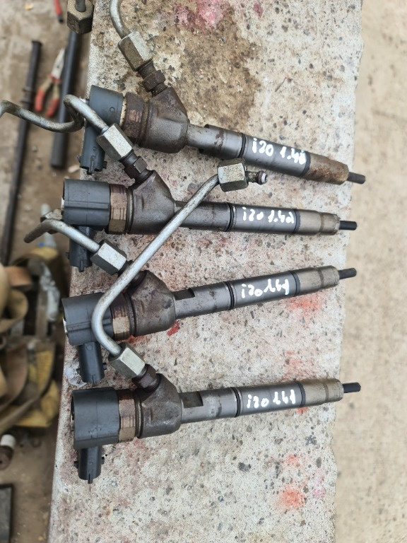 Set 4 injectoare Hyundai i20 1.4 crdi an