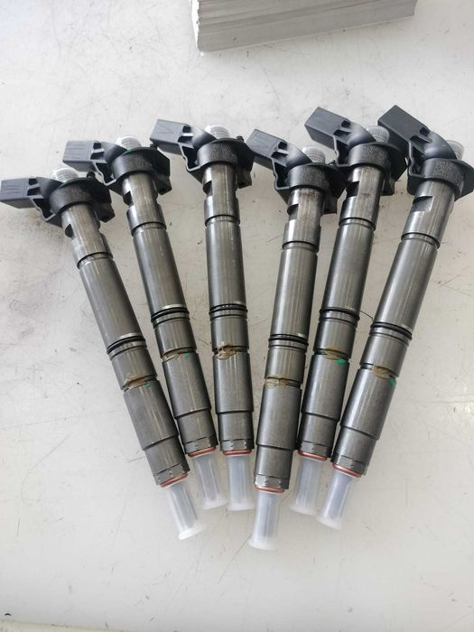 Set 6 injectoare Audi A4 / A6 / A7 / Q7 3.0 d reconditionate.