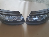 Set faruri stanga dreapta Hyundai Santa Fe An 2006-2010 VOLAN STANGA!