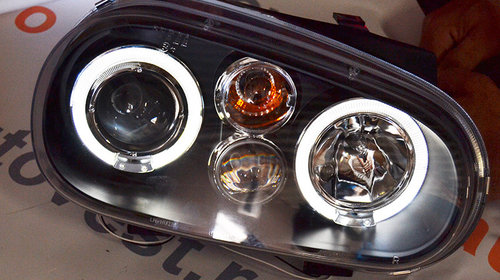 Set Faruri tuning Vw Golf 4 1J 1997-2006 (Hatchback/Combi/Cabriolet) cu Angel Eyes , transparent-negru , tip bec H1+H1 , fara motoras