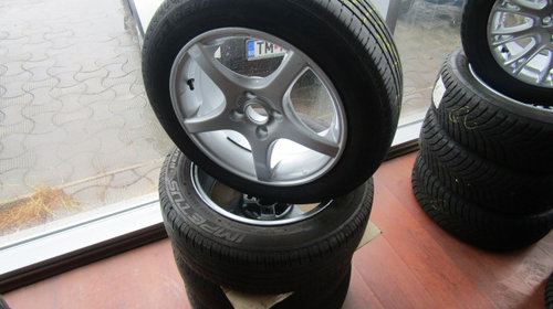 SET JANTE ALIAJ 15'' CU ANVELOPE DE VARA 185/60R15 FORD FIESTA