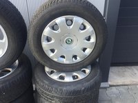 Set jante cu cauciucuri de iarna din otel cu capace,Skoda Octavia 2,195x65x15