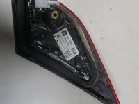 Stop stanga Opel Corsa E (haion) 39012625 BKG