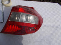 Stop stanga pe Haion VW Golf 5 cod piesa original 1K6945093E