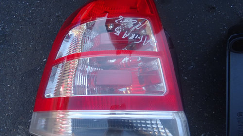 Stopuri Dreapta-Stanga Opel Zafira B din 2010 volan pe stanga cod: 13260854R