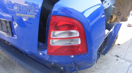 Tripla dreapta spate Skoda Octavia an 2002