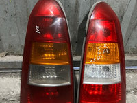 Tripla / Lampa spate Opel Astra G Break stanga