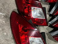 Tripla / Lampa spate Opel Corsa D stanga ( 4 usi )